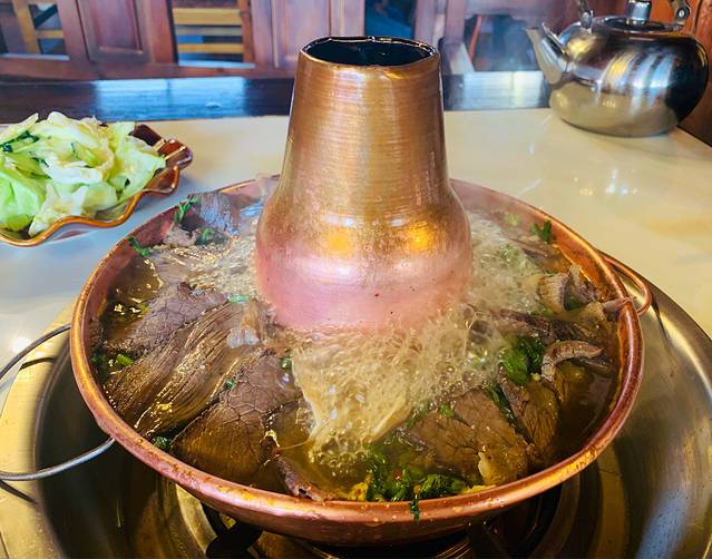 静静的嘛呢石藏餐