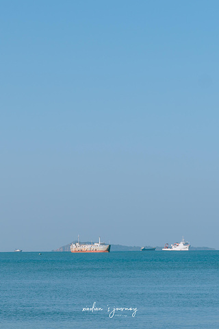 "这一段路的海边种满椰林，营造出大海、沙滩、椰林的美景，而路的另一侧则是众多的酒店、民居等等_椰梦长廊"的评论图片