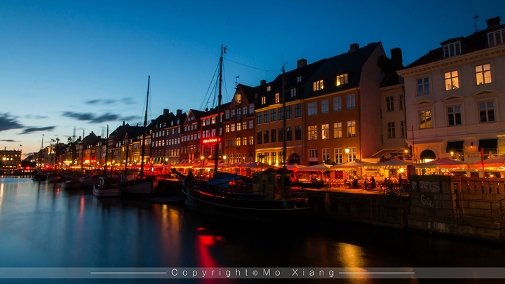 "新港就是那色彩斑斓的地方，很多游客来到哥本哈根第一站都会选择这里，一条长长的运河将这里分隔开，..._新港"的评论图片