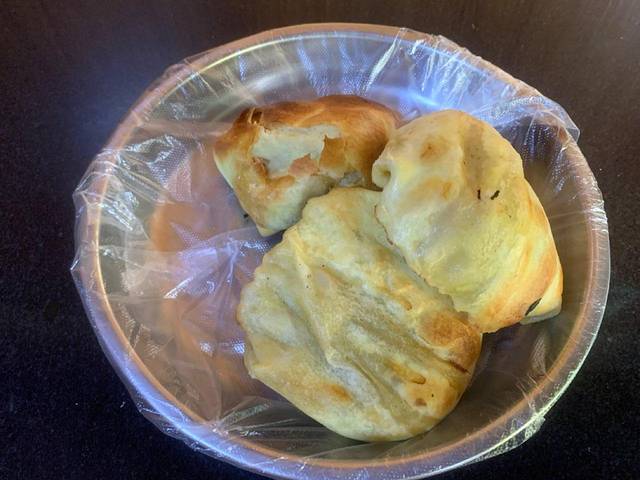 亚生江烤包子店